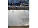 View of a pond with apartment buildings and parking lot at 2276 Essex Dr. # K, Surfside Beach, SC 29575