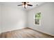 Bright bedroom with natural light, ceiling fan and wood-look flooring at 2428 Park St., North Myrtle Beach, SC 29582