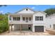 Charming two-story home with a spacious porch and a convenient ground-level garage at 2428 Park St., North Myrtle Beach, SC 29582