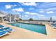 Outdoor pool with lounge chairs at 2501 S Ocean Blvd. # 1011, Myrtle Beach, SC 29577