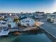 Aerial view of coastal neighborhood homes, with waterfront access and charming architecture at 301 43Rd Ave. N, North Myrtle Beach, SC 29582
