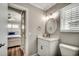 Bathroom featuring a vanity with marble countertop and a view into the bedroom at 301 43Rd Ave. N, North Myrtle Beach, SC 29582