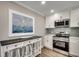 Well-equipped kitchen with breakfast bar offers a sleek and functional space at 301 43Rd Ave. N, North Myrtle Beach, SC 29582