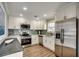 Modern kitchen featuring stainless steel appliances and updated cabinets at 301 43Rd Ave. N, North Myrtle Beach, SC 29582