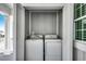 A washer and dryer are conveniently tucked away in this laundry closet at 301 43Rd Ave. N, North Myrtle Beach, SC 29582