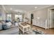 Open-concept living area seamlessly blends dining and living spaces for entertaining at 301 43Rd Ave. N, North Myrtle Beach, SC 29582