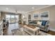 Spacious living room and scenic balcony views, ideal for relaxing at 301 43Rd Ave. N, North Myrtle Beach, SC 29582