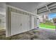 Covered area under the house with doors for storage at 301 43Rd Ave. N, North Myrtle Beach, SC 29582