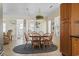 Inviting dining area adjacent to the living room and kitchen, perfect for Gathering meals and entertaining at 306 59Th Ave. N, North Myrtle Beach, SC 29582