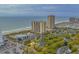 Aerial view of resort buildings, pool area, and beach at 307 Cumberland Terrace Dr. # 5-E, Myrtle Beach, SC 29572