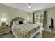 Spacious Primary bedroom with king-size bed and private access to patio at 307 Cumberland Terrace Dr. # 5-E, Myrtle Beach, SC 29572