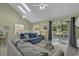Open floor plan living room with a view of the balcony at 307 Cumberland Terrace Dr. # 5-E, Myrtle Beach, SC 29572