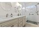 Elegant bathroom with dual vanities, quartz countertops, and a walk-in shower at 327 Simplicity Dr., Murrells Inlet, SC 29576