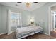 Bedroom with light green walls and a white metal bed frame at 352 Beulah Circle, Conway, SC 29527