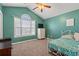 Bright bedroom with green walls and a comfortable bed at 352 Beulah Circle, Conway, SC 29527