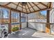 Relaxing screened porch with ceiling fan and concrete floor at 352 Beulah Circle, Conway, SC 29527