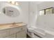 Bathroom featuring single sink vanity, toilet, and shower-tub combination at 401 Indian Wells Ct. # 401, Murrells Inlet, SC 29576