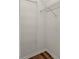 This closet features a hardwood floor, a shoe rack, and white walls at 401 Indian Wells Ct. # 401, Murrells Inlet, SC 29576