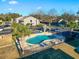 Community pool and surrounding buildings from above at 4714 Cobblestone Dr. # L2, Myrtle Beach, SC 29577