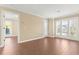 Bedroom with wood-look tile floors and plantation shutters at 4714 Cobblestone Dr. # L2, Myrtle Beach, SC 29577