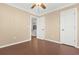 Bedroom with wood-look tile flooring and access to kitchen at 4714 Cobblestone Dr. # L2, Myrtle Beach, SC 29577