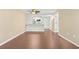 Open living room with kitchen and hardwood floors at 4714 Cobblestone Dr. # L2, Myrtle Beach, SC 29577