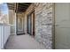 Private patio with brick wall and white railing at 4714 Cobblestone Dr. # L2, Myrtle Beach, SC 29577