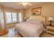 Spacious bedroom with king-size bed and bay window offering natural light at 4809 Luster Leaf Circle # 102, Myrtle Beach, SC 29577
