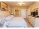 Main bedroom with king bed, ensuite bathroom access, and ample closet space at 4809 Luster Leaf Circle # 102, Myrtle Beach, SC 29577
