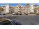 Brick building exterior with parking lot and landscaping at 4809 Luster Leaf Circle # 102, Myrtle Beach, SC 29577