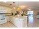 Spacious kitchen with island and modern appliances at 4809 Luster Leaf Circle # 102, Myrtle Beach, SC 29577