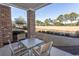 Private patio with table and chairs, overlooking golf course at 4809 Luster Leaf Circle # 102, Myrtle Beach, SC 29577