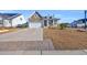 Two-story home with a neutral color scheme and a two-car garage at 5000 Azul Loop, Myrtle Beach, SC 29579