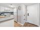 White kitchen with gray countertops, stainless steel sink at 5905 South Kings Hwy. # 5105-D, Myrtle Beach, SC 29575