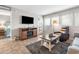 Relaxing living room with fireplace and access to patio at 5905 South Kings Hwy. # 5105-D, Myrtle Beach, SC 29575