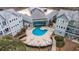 Indoor heated pool with skylights and seating area at 5905 South Kings Hwy. # 5105-D, Myrtle Beach, SC 29575