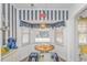 Small dining area with round table and three chairs, perfect for a quick meal at 6001-Z34 S Kings Hwy., Myrtle Beach, SC 29575