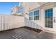 Private backyard with a wooden fence and patio at 618 3Rd Ave. S # 4B, North Myrtle Beach, SC 29582