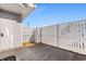 Private backyard with a wooden fence and patio at 618 3Rd Ave. S # 4B, North Myrtle Beach, SC 29582