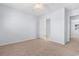 Bedroom with carpet, ceiling fan, and access to bathroom at 618 3Rd Ave. S # 4B, North Myrtle Beach, SC 29582
