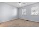 Simple bedroom with neutral walls and carpet at 618 3Rd Ave. S # 4B, North Myrtle Beach, SC 29582