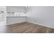 Dining area with hardwood floors and kitchen access at 618 3Rd Ave. S # 4B, North Myrtle Beach, SC 29582