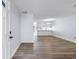 Bright living room with hardwood floors and an open floor plan at 618 3Rd Ave. S # 4B, North Myrtle Beach, SC 29582