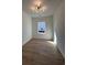 Bright bedroom with light wood floors and a window offering natural light at 640 Carter Reid Ct., Conway, SC 29526