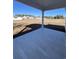 Large covered patio with grey tile flooring and pond view at 640 Carter Reid Ct., Conway, SC 29526