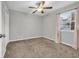 Empty bedroom with neutral walls, carpet, and natural light at 661 Tupelo Ln. # 16B, Longs, SC 29568