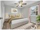 Well-lit bedroom featuring a large window and neutral decor at 661 Tupelo Ln. # 16B, Longs, SC 29568