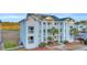 Beautiful condominium with verdant landscaping, and lovely balconies and nice exterior finishes at 661 Tupelo Ln. # 16B, Longs, SC 29568