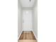 Condo entrance displaying a clean white door, modern flooring, and a welcoming atmosphere at 661 Tupelo Ln. # 16B, Longs, SC 29568