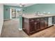 Open-concept kitchen featuring modern appliances, sleek countertops, and an adjacent dining area at 661 Tupelo Ln. # 16B, Longs, SC 29568